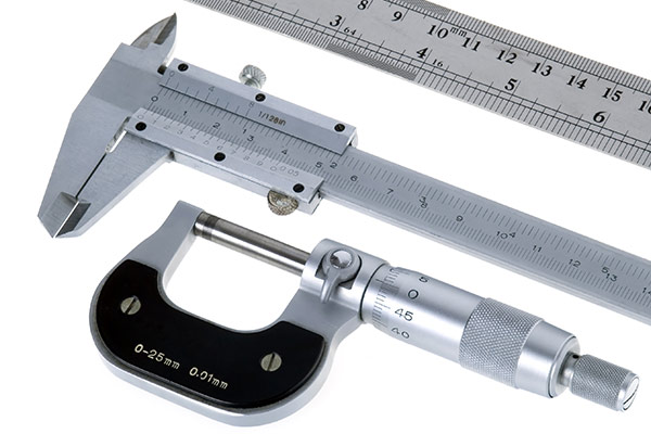 ruler, micrometer and vernier compass are together. group of measurement tools.